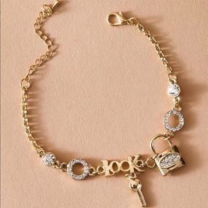 Gold charm bracelet